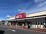 周辺：スーパー　ベルクス 松飛台店まで徒歩9分