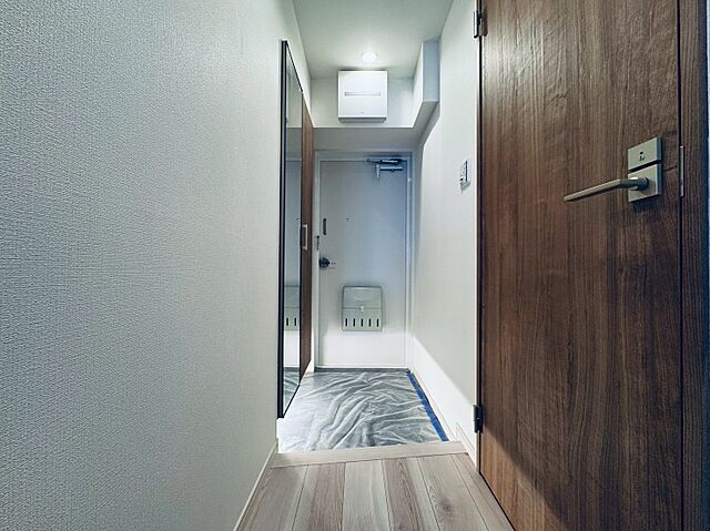 玄関 メガロン仲六郷 8階/-