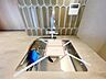 キッチン：浄水器一体型水栓を採用しています。