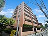 外観：ゆとりある日々は、この美しい住まいから生まれる。（空の加工を生成AIで行っています）