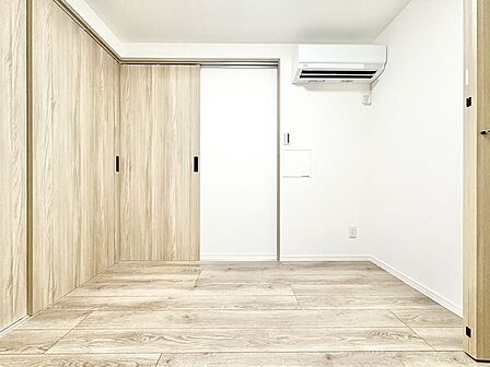 可動域が少なくお部屋を広く使える引戸を採用。フルオープンにするとひとつなぎの空間に見えます。
