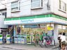 周辺：ファミリーマート調布駅北店 433m