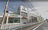 周辺：サンリブ折尾店（496m）