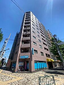 外観：本郷通りに面した新耐震基準マンションです。管理体制も良好です。店舗・事務所兼自宅をお探しを方におすすめの物件です。居住用・投資用どちらもご検討頂けます。