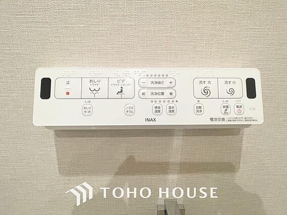 温水によって洗...