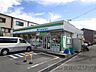 周辺：ファミリーマート 高槻芝生住宅前店 徒歩12分。 890m