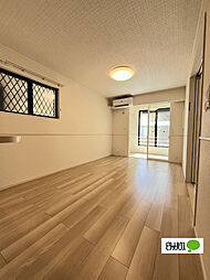 フレスコ・パッソII 101 1階1LDKのリビング/ダイニング