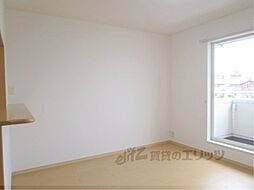 ストロベリーフィールズI番館 201 2階1LDKのリビング/ダイニング