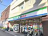 周辺：ファミリーマート薬ヒグチ弥刀駅前店 徒歩6分。 450m