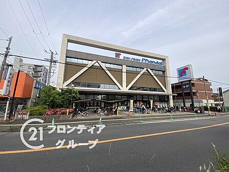 万代志紀店 徒歩12分。 940m