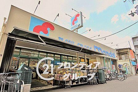 万代花園店 徒歩14分。 1110m