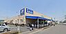 周辺：スーパーバリュー越谷店（870m）