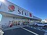 周辺：ドラッグストアセキ　梅郷店（1190m）