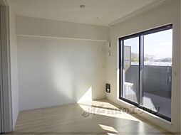 ラクーン守山 303 3階1LDKのリビング/ダイニング