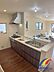 キッチン：料理をしながらリビング全体を見渡せるカウンターキッチン