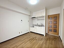 近鉄橿原線 新ノ口駅 徒歩5分の賃貸マンション 5階2DKのリビング/ダイニング