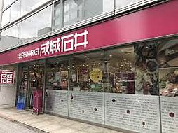 【スーパー】成城石井 小伝馬町店まで390ｍ