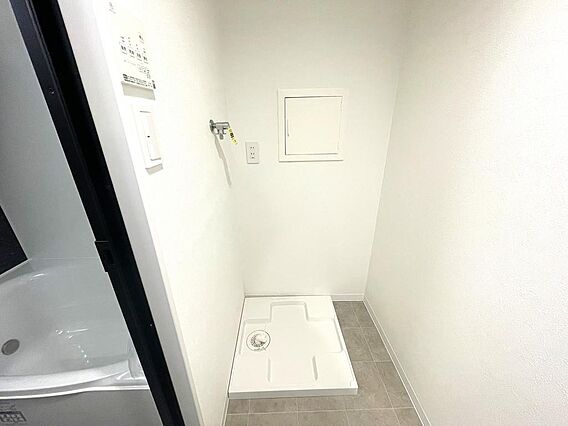 洗濯機置き場で...