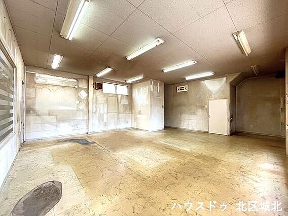 【1階店舗スペ...