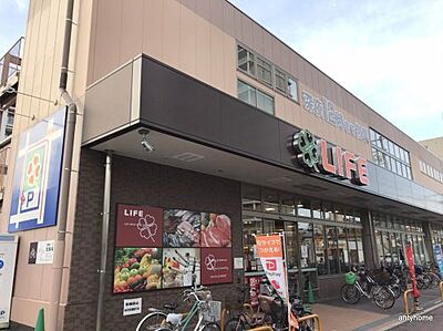 周辺：【スーパー】ライフ 玉造店まで1221ｍ