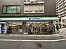 周辺：ファミリーマート甲東園駅東口店 徒歩6分。 480m