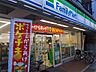 周辺：ファミリーマート 塚本西荻南店（152m）