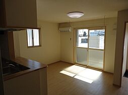 アラモード スクエア 1階1LDKのリビング/ダイニング