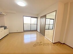 近鉄生駒線 一分駅 徒歩4分の賃貸マンション 2階1LDKのリビング/ダイニング