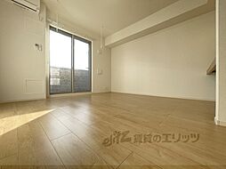 Ｂｅｌｌ　Ｖｉｌｌｅ　Ｂ−II 101 1階ワンルームのリビング/ダイニング