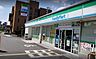 周辺：ファミリーマート生駒辻町店 780m