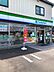 周辺：コンビニ 1100m ファミリーマート巻駅前店