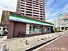 周辺：ファミリーマート 泉大津なぎさ町店 590m