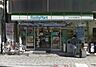 周辺：ファミリーマートマツエダ北堀江店 582m