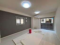 キュリアスＫ 1階1LDKのリビング/ダイニング