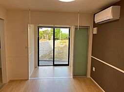 エルシオンII 105 1階1LDKのリビング/ダイニング