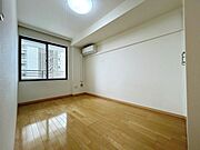 リビング横の約6.0帖洋室（エアコン設置）