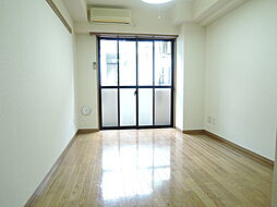 オータムスクウェアヴィレッジ E101 1階1Kのリビング/ダイニング