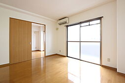 伊予鉄道市駅線 警察署前駅 徒歩3分の賃貸マンション 3階2LDKのリビング/ダイニング