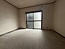 洋室：お子様がお部屋で過ごす時間が明るく楽しくなるような印象！