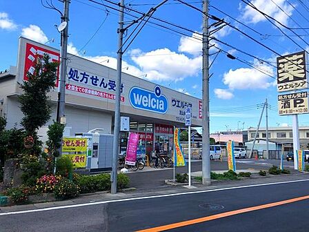 ウエルシア流山向小金店まで984m