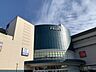 周辺：本牧フロント　1200m　スーパー三和、ホームセンターコーナン、デジタル＆生活家電専門店ノジマなどからなる商業施設。 