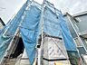 外観：建築中の住宅外観青いシートがかかっています