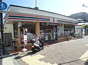 コンビニ、セブンイレブン神戸岡本２丁目店まで徒歩１２分(９６８ｍ)