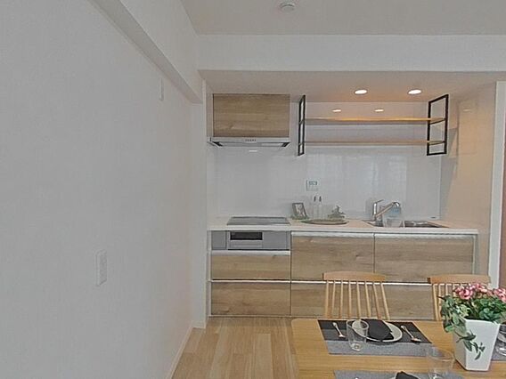 ッチンは家族の...