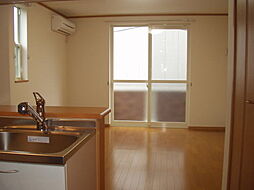 シャン・ド・フルール 201 2階1LDKのリビング/ダイニング