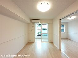 プラウド四屋　I 102 1階1LDKのリビング/ダイニング