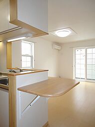 プレミア　ネクスト 101 1階1LDKのリビング/ダイニング