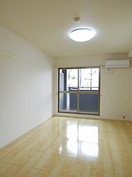 カーサ　デル　リオ 104 1階1Kのリビング/ダイニング