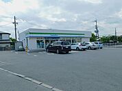 【コンビニエンスストア】ファミリーマート駒生二丁目店まで700ｍ