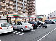【コンビニエンスストア】セブン小倉日明4丁目店まで300ｍ